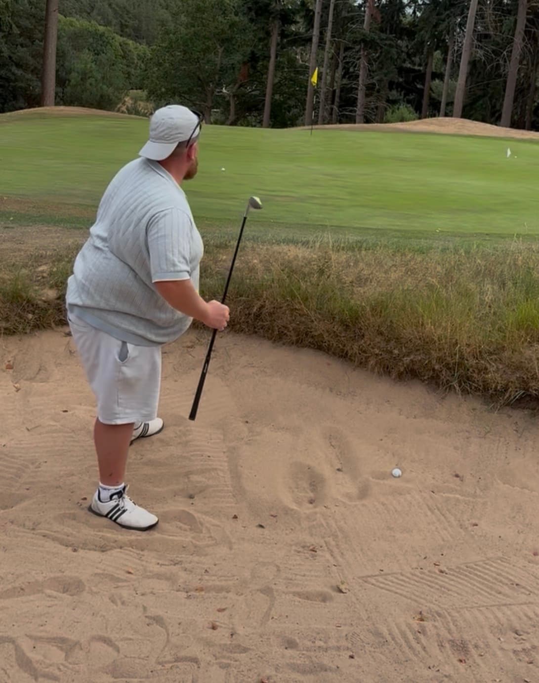 Golf action from the bunker